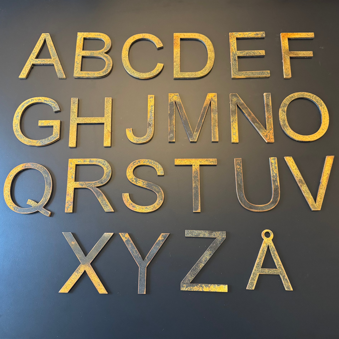 Aufgeschweißter Buchstabe aus Cortenstahl